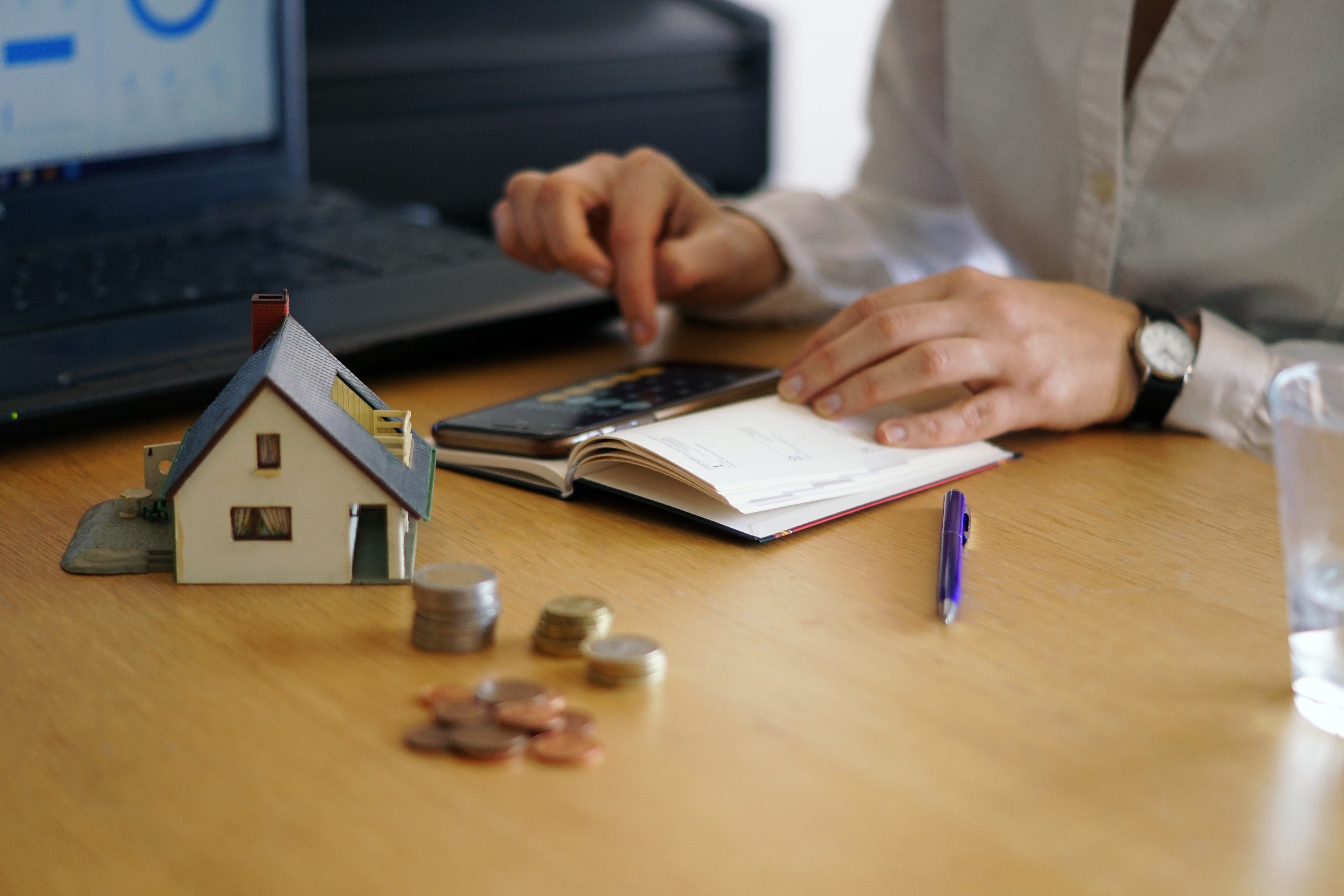 Real estate agent calculating home buyer stamp duty savings