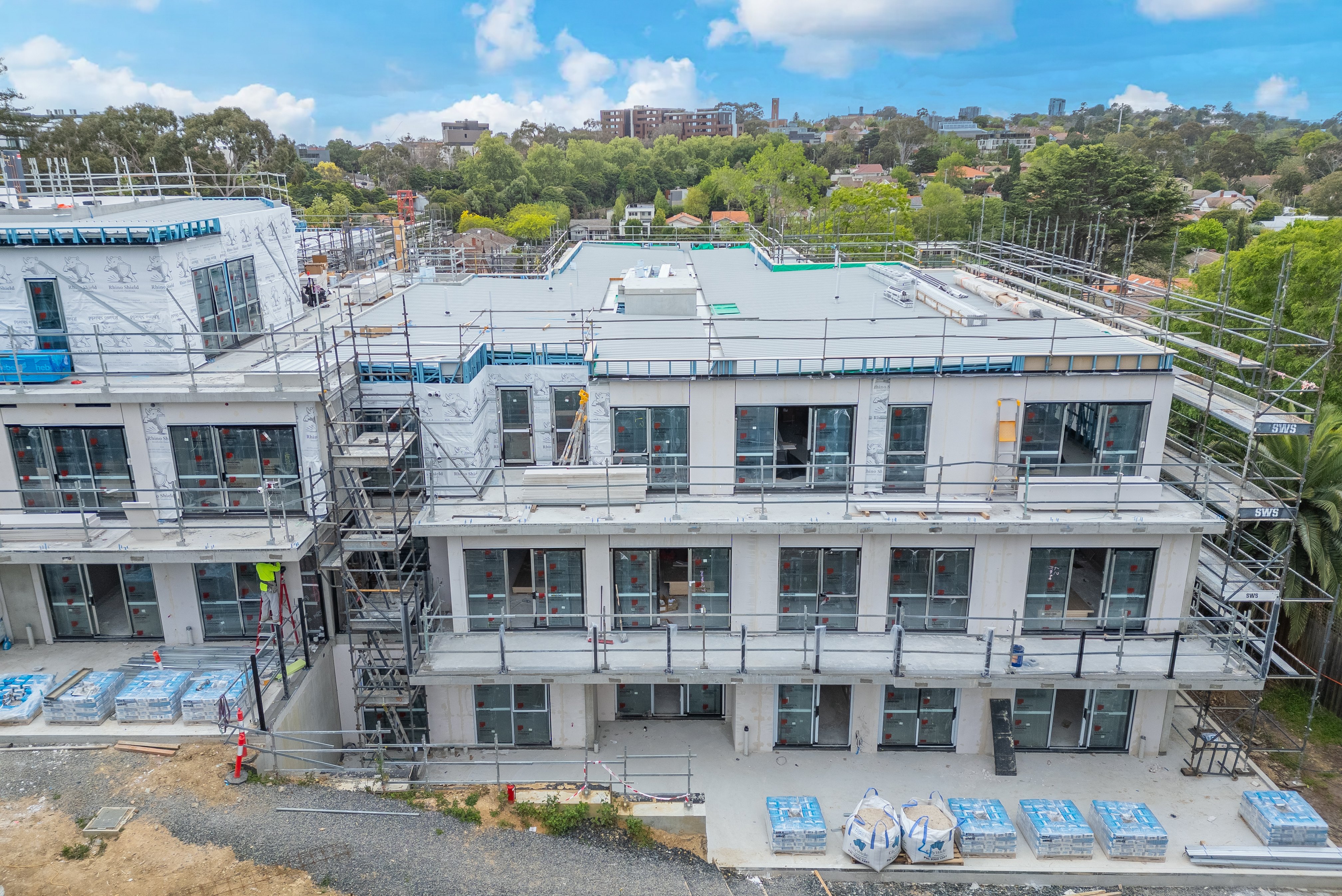 Riverbend Ivanhoe October Construction Update: Crane Down, Roofs On